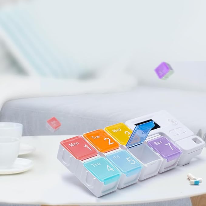 SAFIGLE 7-Compartment Rainbow Weekly Pill Organizer with Timed Alarm Reminder, Plastic Portable Medication Container for Travel and Home Use